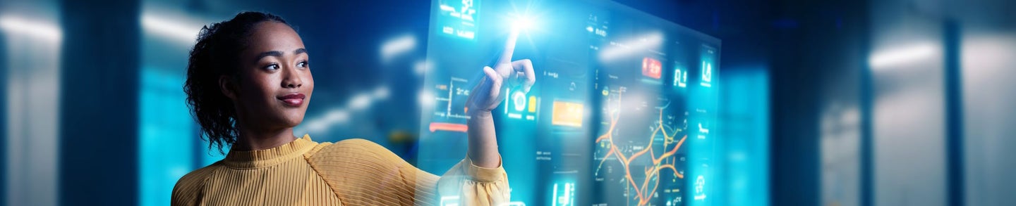 A female engineer in the near future who operates a hologram screen