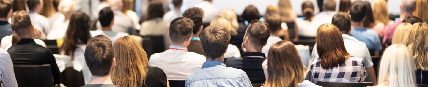 Speaker giving talk on conference hall